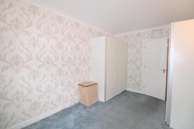 Bedroom one with fitted wardrobes