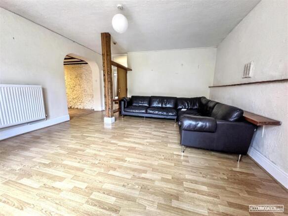 Spacious living area with sleek leather seating...