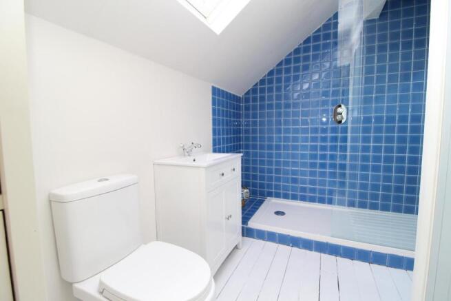 EN-SUITE SHOWER ROOM