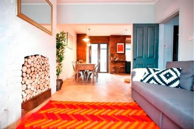 Bright open-plan lounge with dining area...