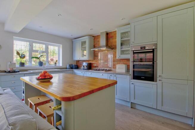 Showing island bar and wine storage