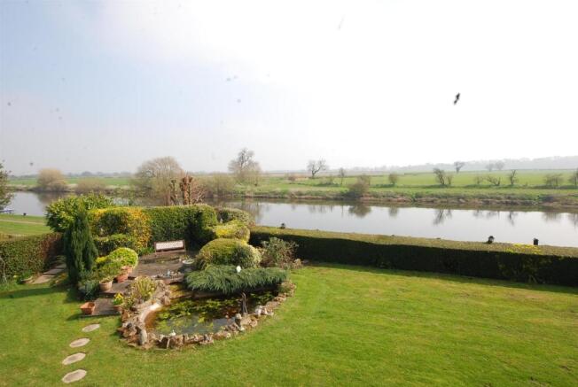 garden and river view from bed 1.JPG