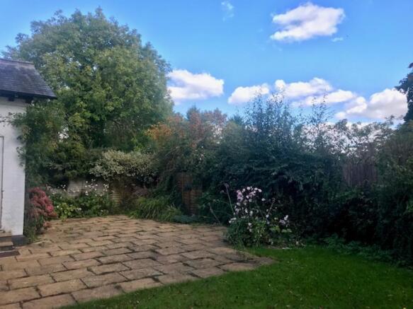 Paved/lawn easily maintained very private garden w