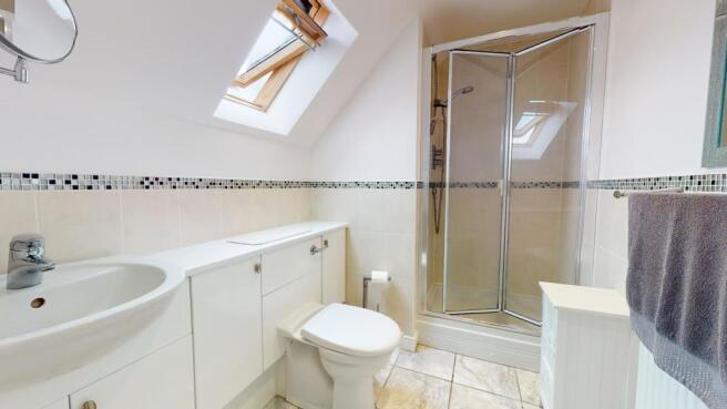 EN-SUITE SHOWER ROOM