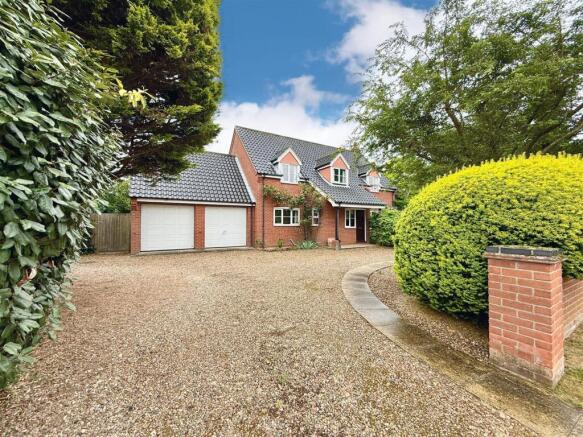 front aspect and driveway