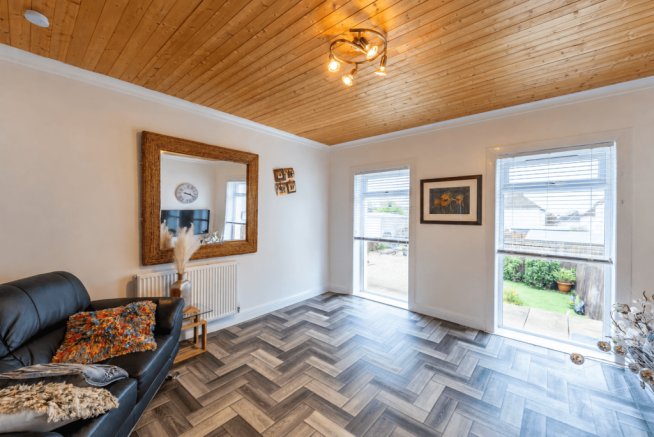 Cozy Herringbone Lounge with Garden Views
