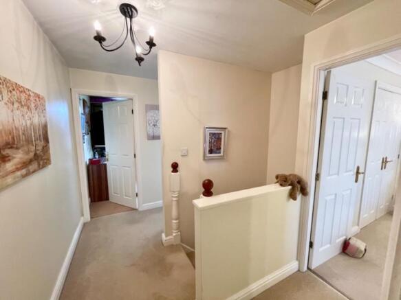 TO THE FIRST FLOOR LANDING: