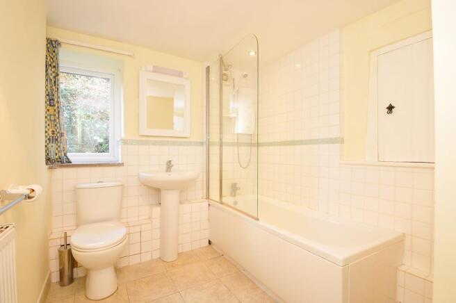 Bathroom with shower over bath