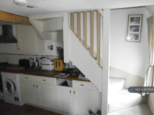 Stairs Up From Kitchen/Living Area