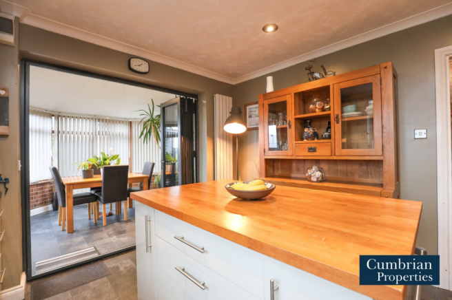 Dining Kitchen Bi-Folding Doors to Sunroom