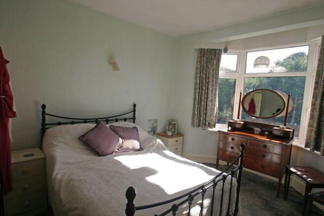 FIRST BEDROOM