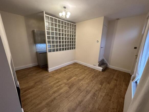 Living room kitchen different angle.jpg