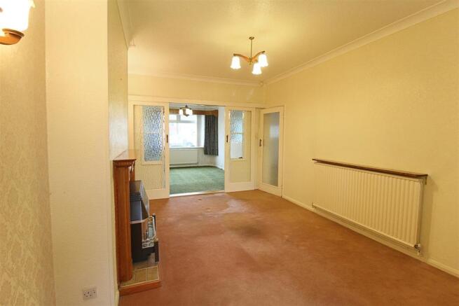 DINING/SEPARATE SITTING ROOM
