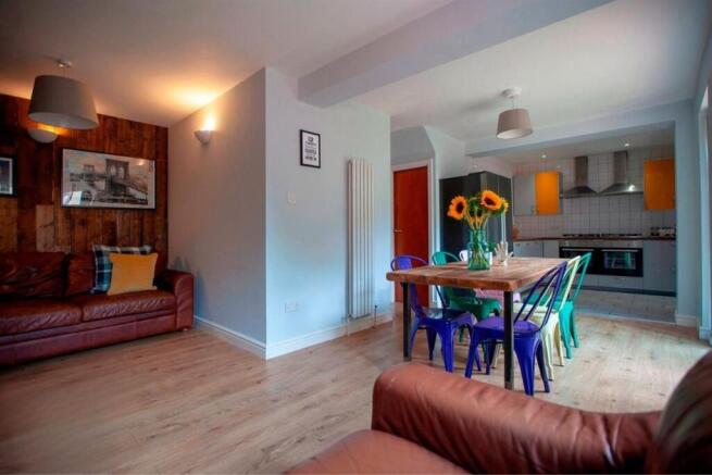 Bright open-plan living and dining area...