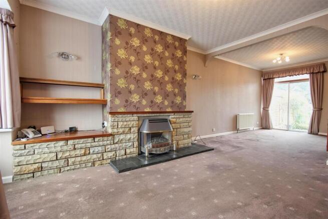 THROUGH LOUNGE AND DINING ROOM