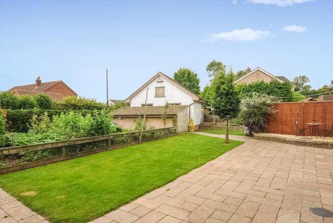 Detached gararge with vehicular access