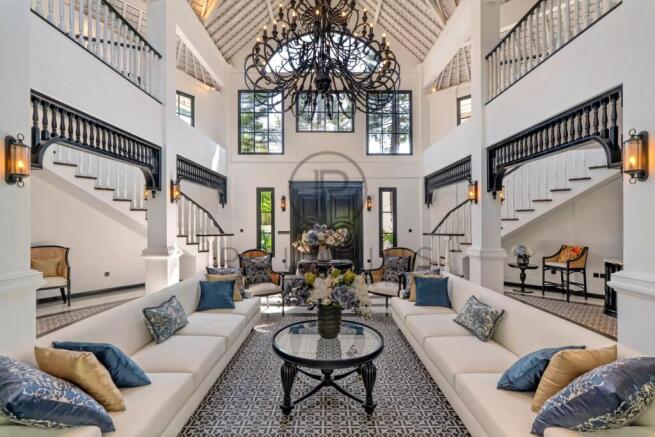 Elegant and spacious two-story living room with hi