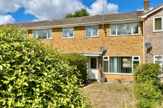 Three bedroom mid terrace house with garage