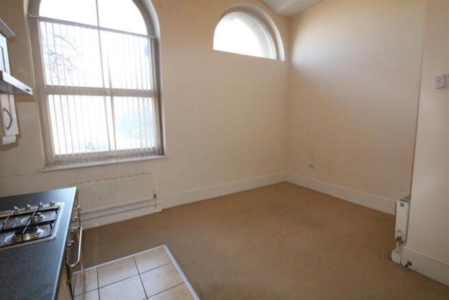 LOUNGE WITH KITCHEN AREA
