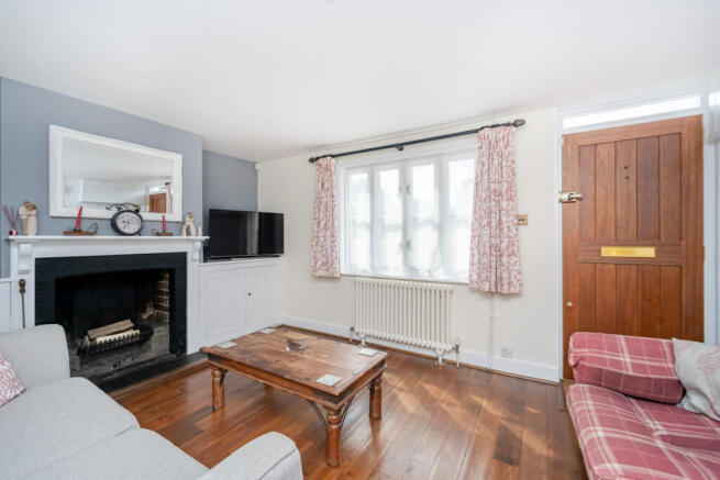 Living room with open fireplace