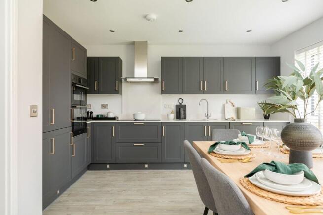 A modern kitchen & dining area with ample storage