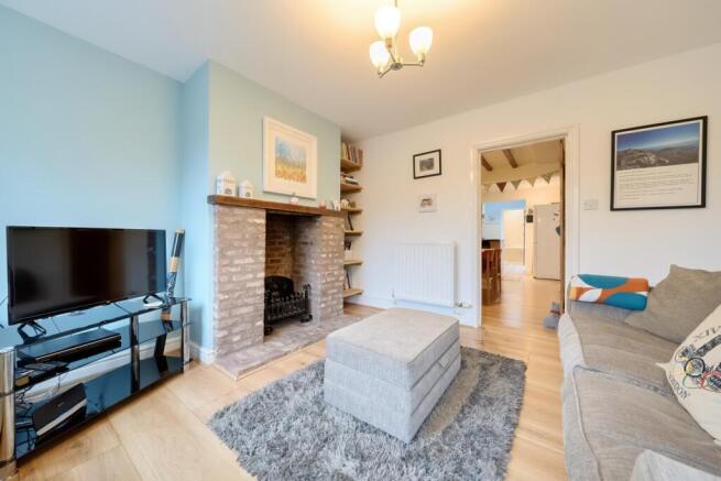 Living room through to dining room and kitchen