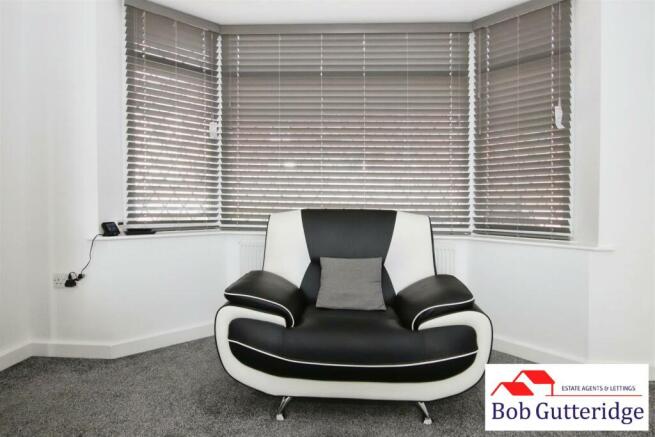 THROUGH LOUNGE / DINING ROOM