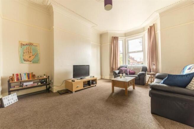 A spacious and inviting large modern living roo...