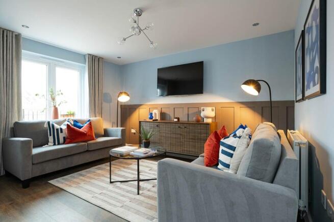 There's plenty of space for two 3-seater sofas in the living room