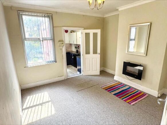 SITTING ROOM DINING ROOM AND KITCHEN