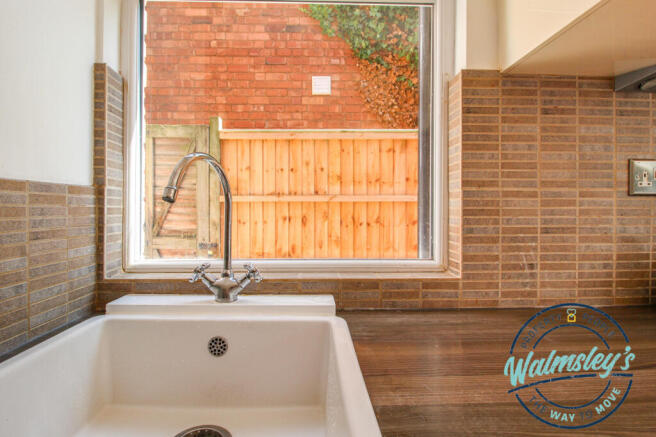 Kitchen with view to side aspect