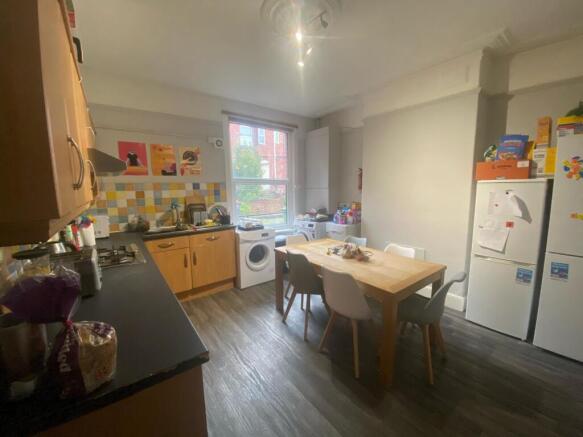 Bright and spacious kitchen with ample natural ...