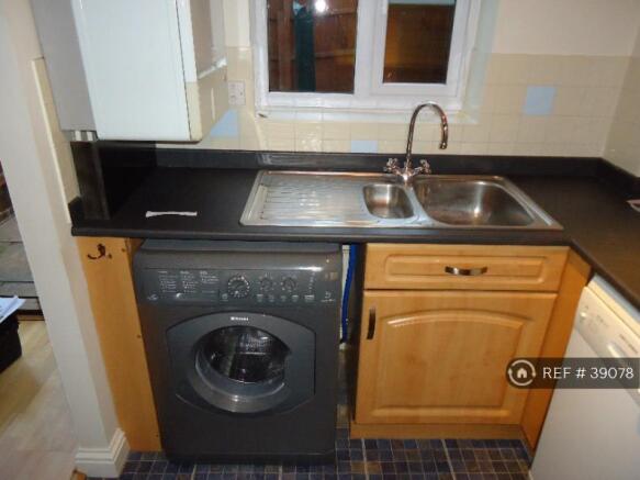 Kitchen With Hotpoint Washer Dryer