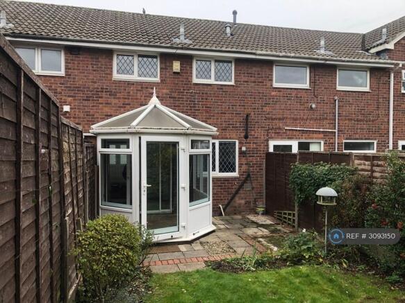 Back Garden With Conservatory