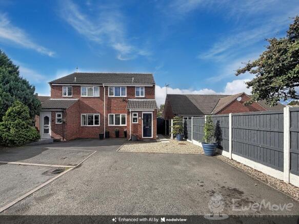 Front of House and Ample Drive