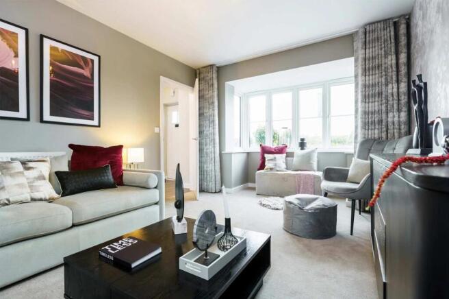 A cozy and stylish living room with a comfortable sofa, decorative pillows