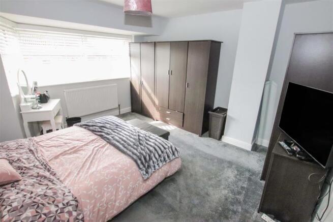 BEDROOM ONE  (FRONT)