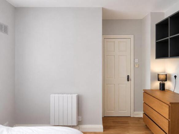 Room 3 ¿ double bed and bedside table