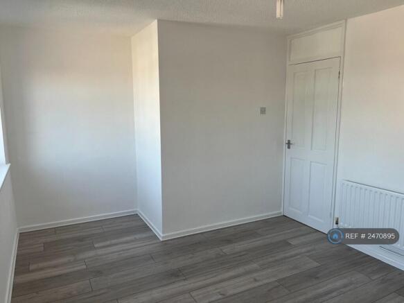 Front Bedroom With Two Windows