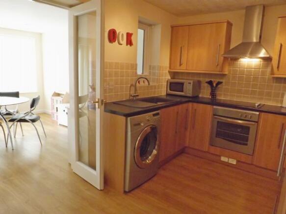 Kitchen through dini