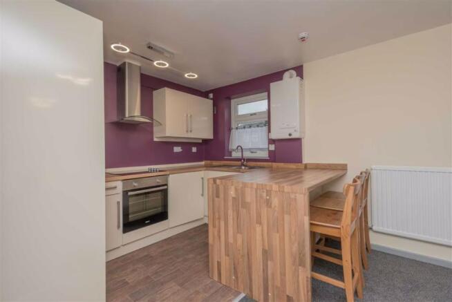 Open Plan Living Room & Fitted Kitchen: