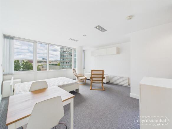 A609, One Park West - living area and bed.jpg