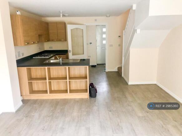 Living Area/Kitchen From Patio Door