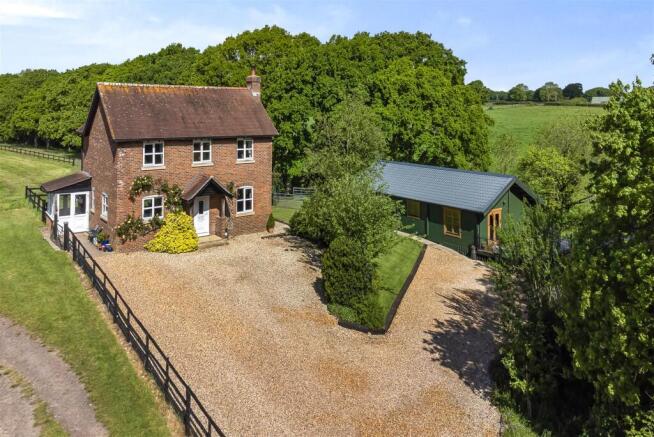 Front elevation and Wooden House