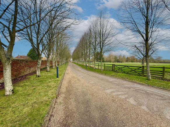 Lead Up To Gated Entrance To Property