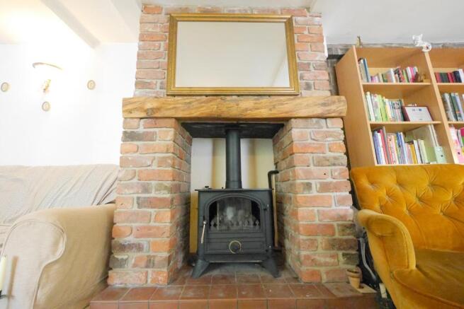 Exposed brick fireplace