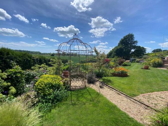 7890  steel pergola grassed