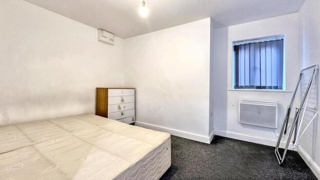Bright double bedroom with ample floor space...