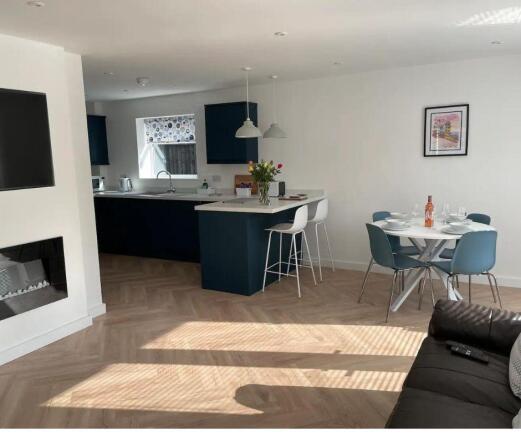 LIVING/DINING AREA - ADDITIONAL PHOTOGRAPH