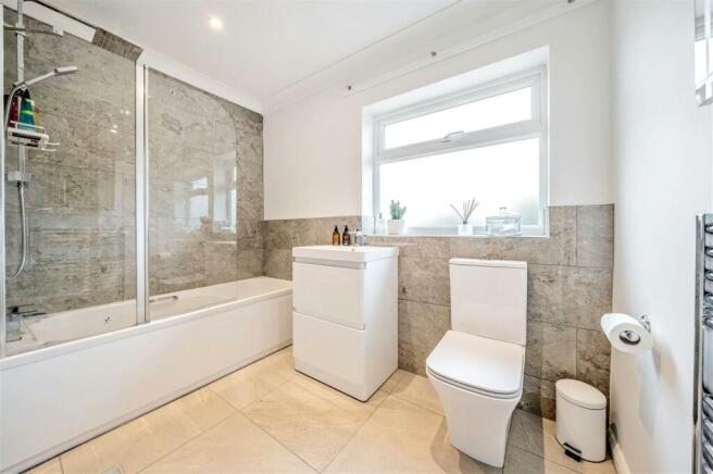 BATHROOM WITH SEPARATE SHOWER OVER